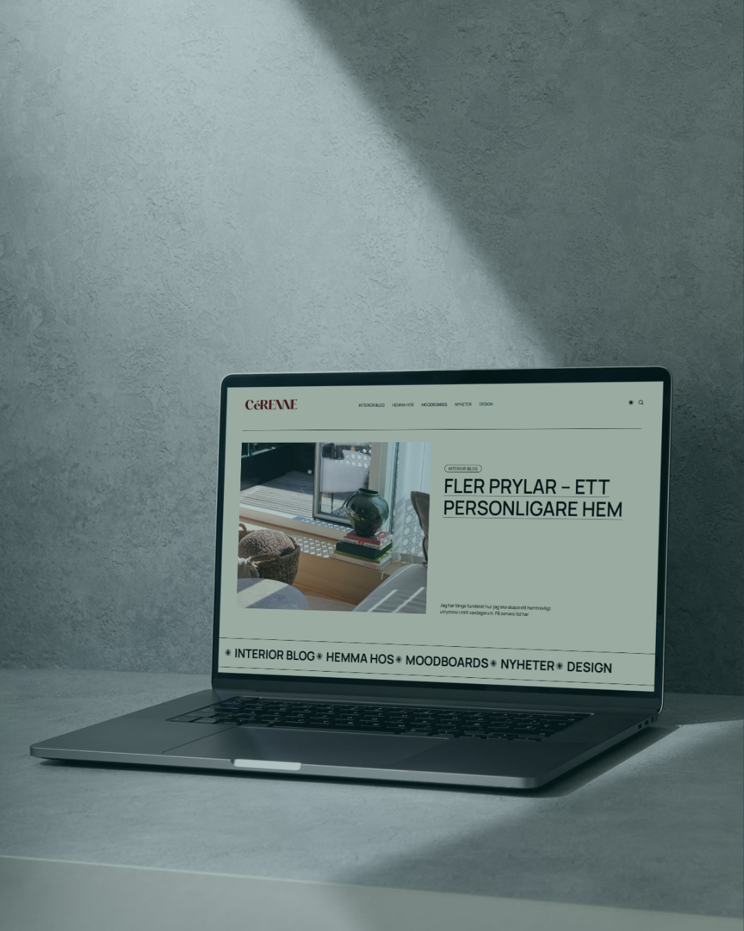 Cérene webbplats presenterad på en bärbar dator